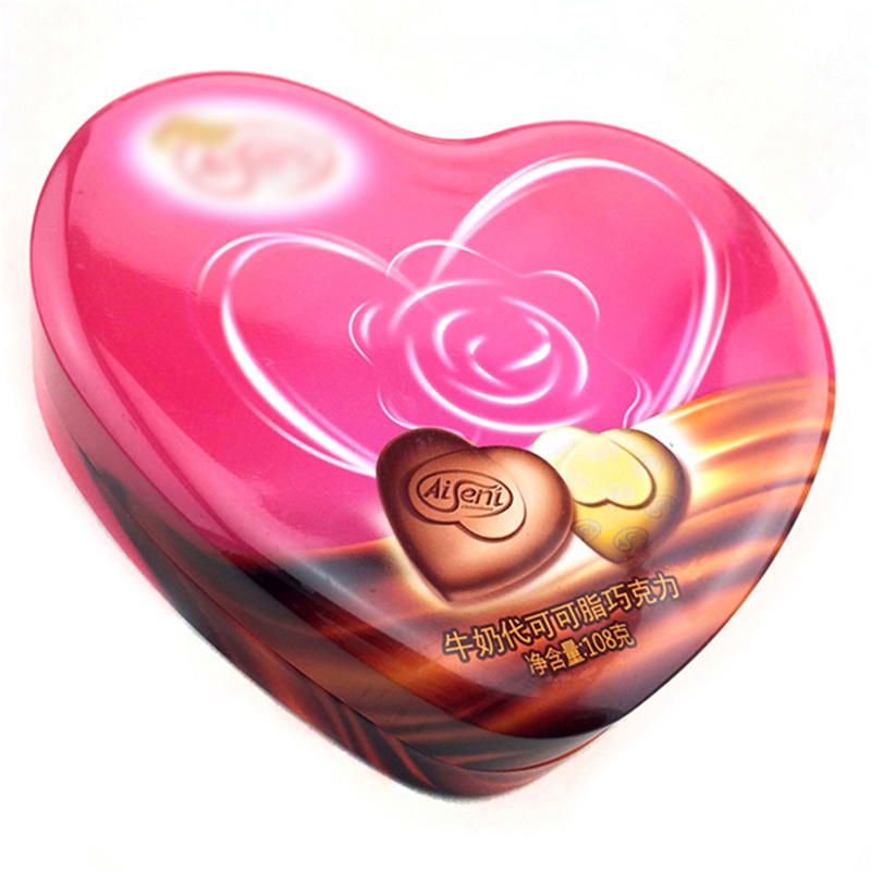 Scatola di latta di cioccolato caramelle a forma di cuore alimentare