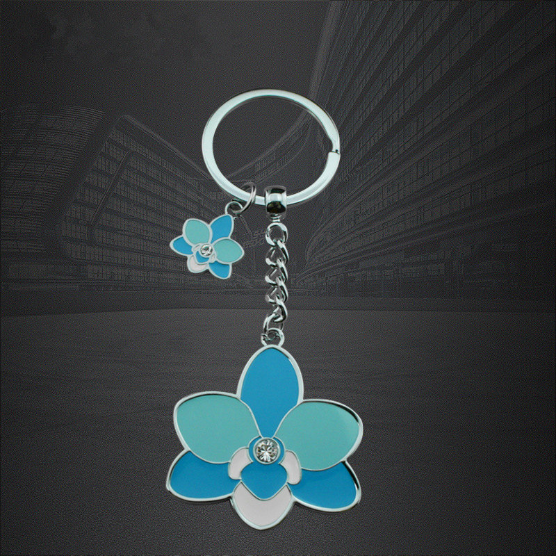 Portachiavi con portachiavi in ​​resina epossidica personalizzati a forma di fiore in zinco-lega di fiori