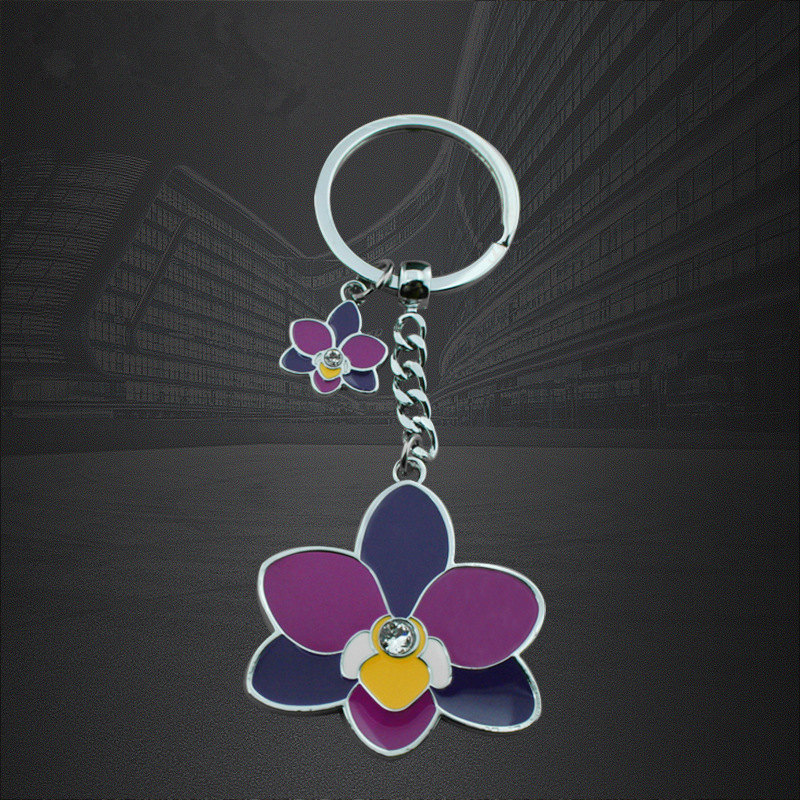 Portachiavi con portachiavi in ​​resina epossidica personalizzati a forma di fiore in zinco-lega di fiori