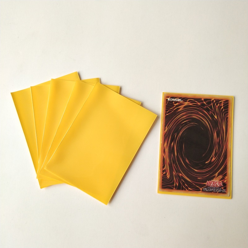 Manicotti protettivi per carte da gioco giallo solido di dimensioni giapponesi YX 62X89mm