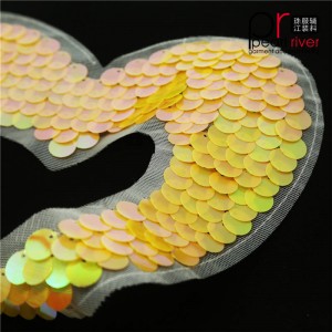 Patch in paillettes arancione a forma di cuore