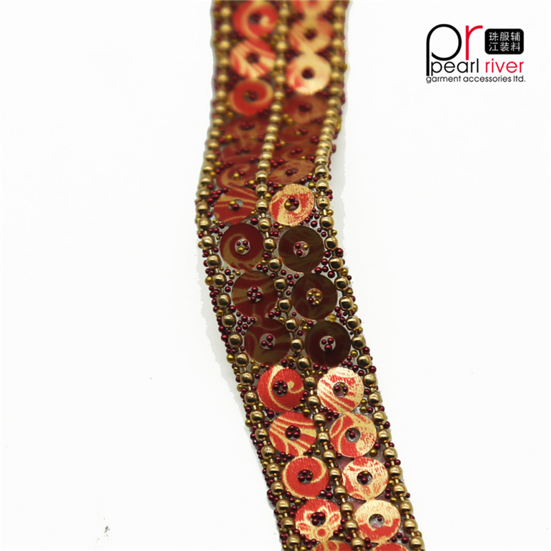 Bordature nuove con paillettes arancio cucito doppio