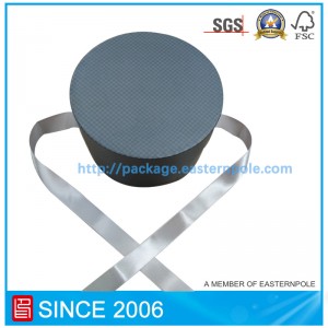 Scatola tonda di lusso con chiusura a nastro