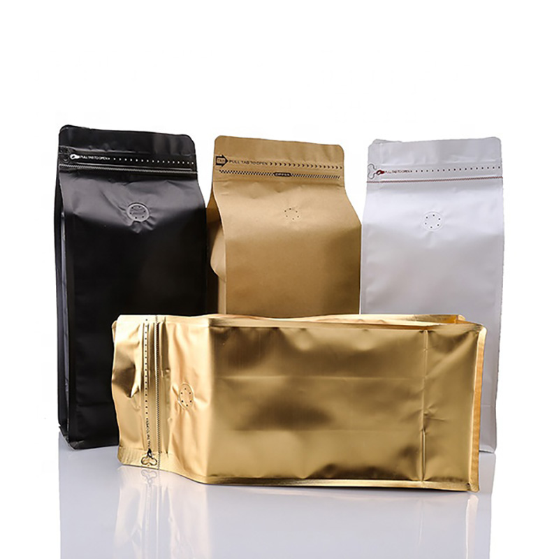Sacchi di chicchi di caffè in carta kraft marrone a fondo piatto di alta qualità da 100 g 250 g 500 g 1 kg con valvola e chiusura a zip