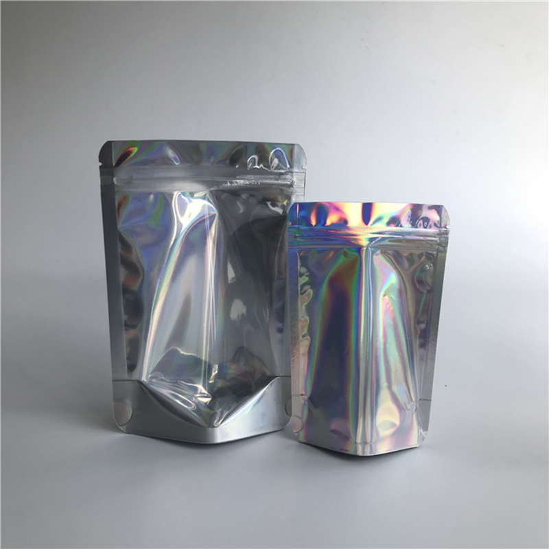Sacchetti della chiusura lampo cosmetici di plastica laminati sacchetti trasparenti olografici anteriori richiudibili all'ingrosso che imballano in azione