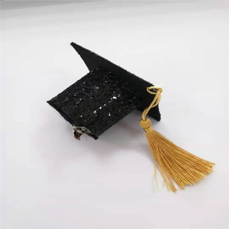 Cappello da laurea bianco e nero con fiocco glitter per festa