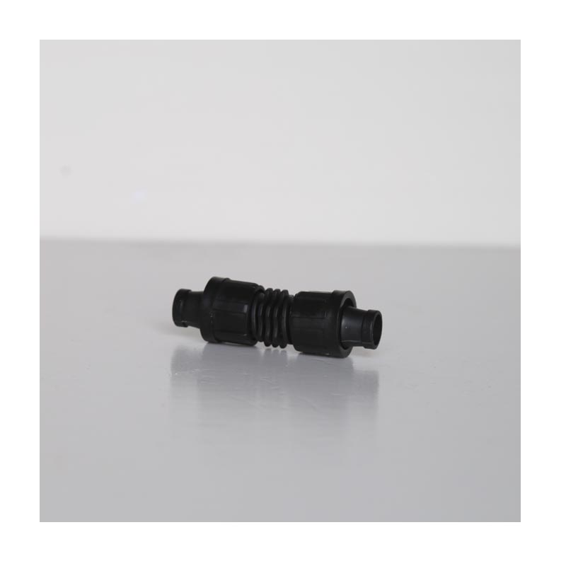 Blocco di connessione per nastro a goccia/tubo