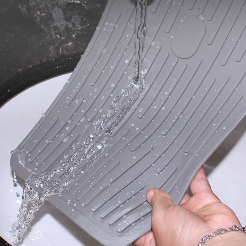 Pulsante rettangolare per trattenere il tampone di scarico