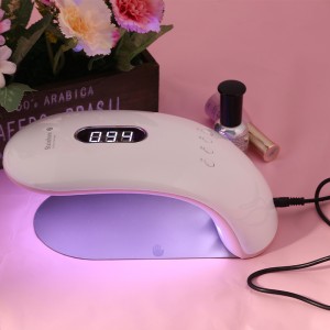 La donna può contenere metà della lampada terapeutica della luce del cielo arcobaleno 2