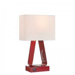 Piccolo lampada da scrivania con finitura rossa, una porta di ricarica USB, una stazione di ricarica wireless e un interruttore a rocker su/off presso la camera