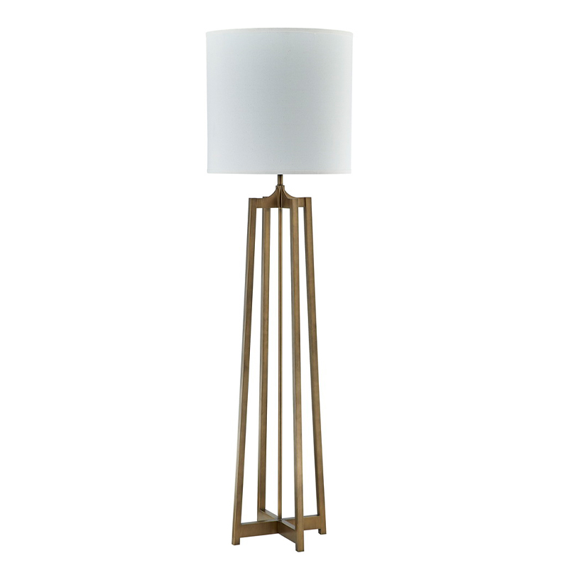 Divano Hyatt Hotel accanto alla lampada da pavimento con finitura in oro antico in camera