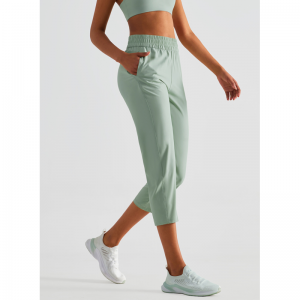 Pantaloni sportivi a prova di sole a secco rapido tascabile