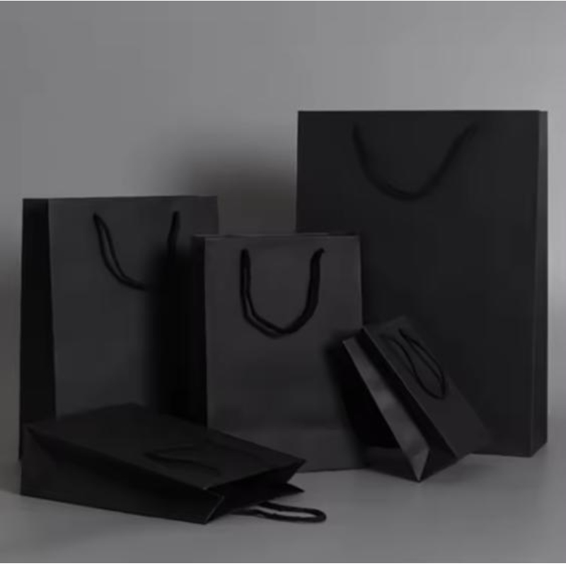 Sacchetti di carta da imballaggionero di lusso stampato abbigliamento da logo personalizzato shopping gioielli sacche da vino